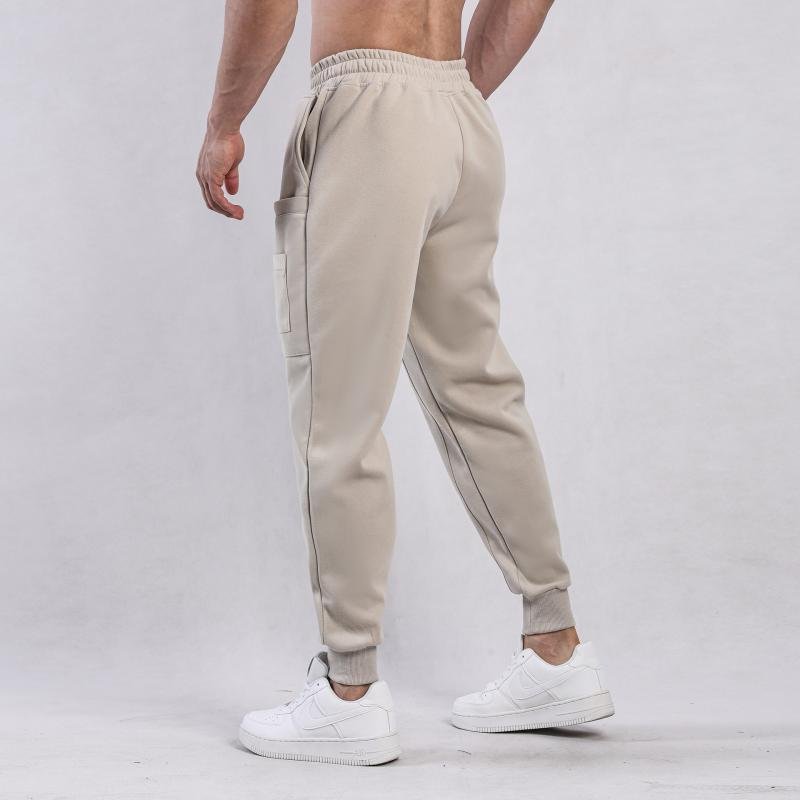 Men's Solid Color Elastic Waist Loose Sports Pants 46646698Z