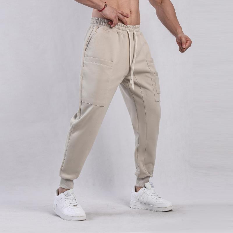 Men's Solid Color Elastic Waist Loose Sports Pants 46646698Z