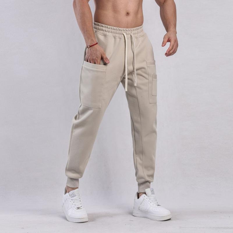 Men's Solid Color Elastic Waist Loose Sports Pants 46646698Z