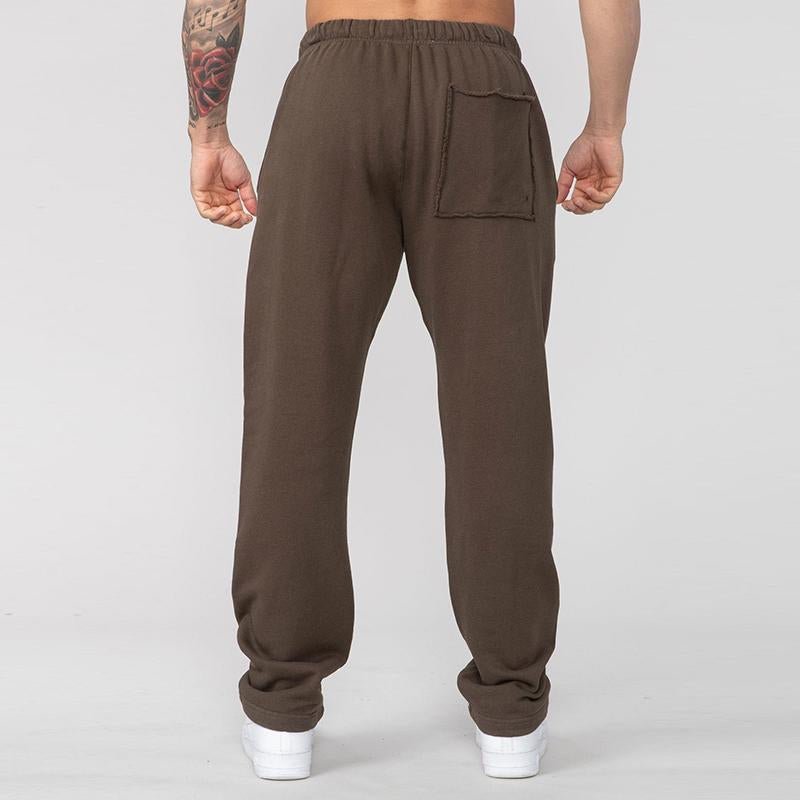 Men's Casual Solid Color Cotton Elastic Waist Loose Sports Pants 74979046M